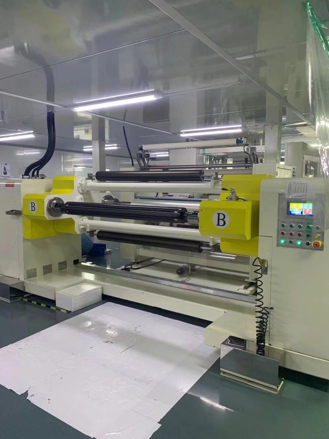 Automatic lamination and rewinding line