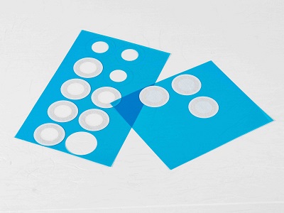 Pressure equalization vent membrane discs on release liner